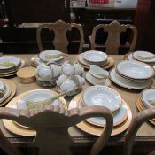 Approximately 68 pieces of gold decorated tea and dinnerware from Thailand