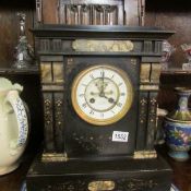 A Victorian black marble mantel clock by Hyde & Sons,