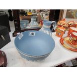 A Wedgwood blue Jasper ware bowl and jug