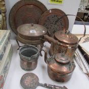 A quantity of Arabian copperware including kettles,