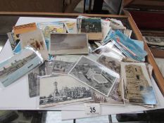 A quantity of postcards including Sutton-on-Sea