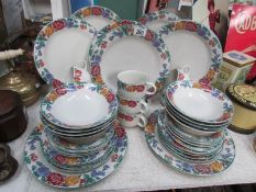A floral patterned dinner and coffee set