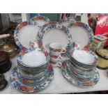 A floral patterned dinner and coffee set