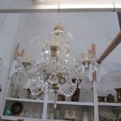 A 5 light glass chandelier