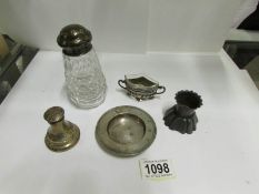 A silver topped sugar sifter,
