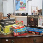 A mixed lot of boxed toys including microscope,