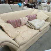 A large double knoll end sofa