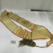 An embroidered sash