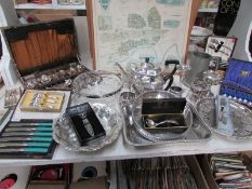 A mixed lot of silver plate including cased cutlery, teapots,