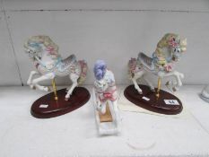 2 porcelain carousel horses and a rocking horse