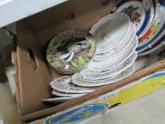 A box of assorted collector's plates including Wind in the Willows