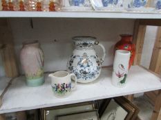 A large jug, 3 vases and a smaller jug,