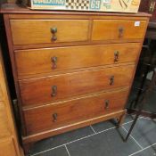 A pale mahogany 2 over 3 chest of drawers