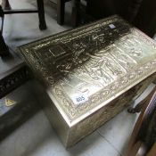 A brass log box