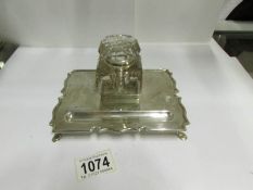 A silver desk stand with glass inkwell (inkwell a/f)