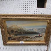 A gilt framed lake and mountain scene oil on board signed S E Reid,