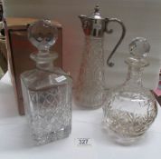 A Royal Doulton cut glass decanter,