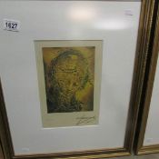 A framed and glazed Salvador Dali artist's proof print bearing the signature 'Dali' in charcoal