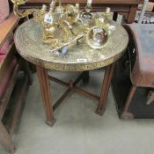 A Middle Eastern  brass topped table