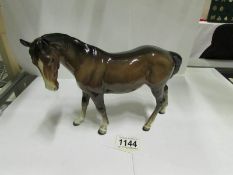 A Beswick horse (repair on leg)