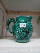 A Wedgwood jug with hunting scene and hound handle