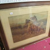 A large oak framed print of a horse and its handler