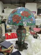 A large Tiffany style table lamp