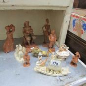 6 carved wood figurines and a quantity of celluliod figures
