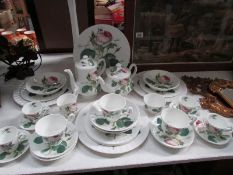 A 4 person Roy Kirkham 'Redoute Roses' tea set (missing 1 tea cup)