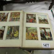An album containing approximately 200 German picture trade cards depicting German living and