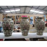 A set of 3 vases