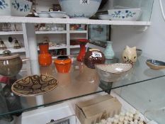 11 items of art pottery,
