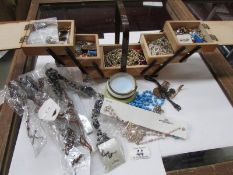 A mixed lot of costume jewellery including musical box