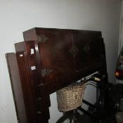 A 1930's wooden fire surround with cabinet top