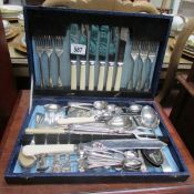 A cased cutlery set and other cutlery