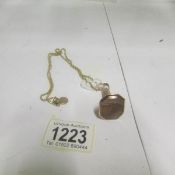 A 19th century agate set seal attached to a 14ct gold chain, approx. 8.