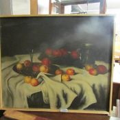 An oil on canvas still life with apples,