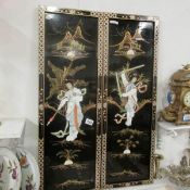 A pair of Oriental mother  of pearl panels