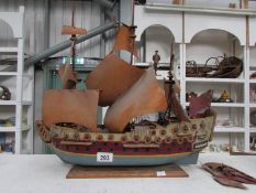 A model of a sailing ship,