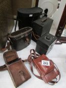 3 vintage camera's and 3 binoculars