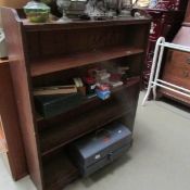 An Edwardian book case with 2 bottom drawers