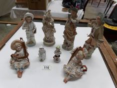 8 Victorian figurines including girls on swings