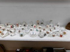 A mixed lot of crested china including Goss, Tank,