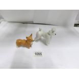 A Beswick poodle and a Beswick Welsh corgi