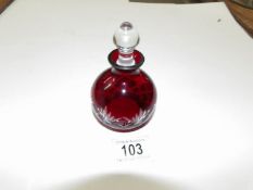 A ruby glass scent bottle