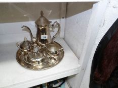 A silver plate coffee pot, sugar bowl,