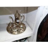 A silver plate coffee pot, sugar bowl,