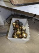 A quantity of brass door knobs etc