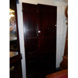 A pair of 6ft tall slatted wooden screens