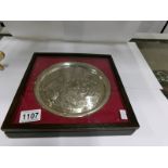 A silver Nativity plaque in glazed case